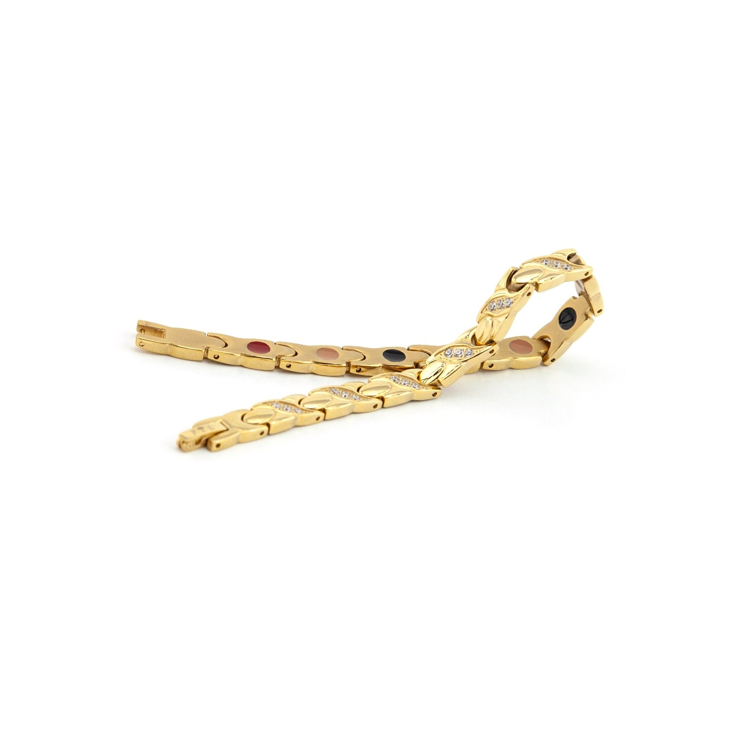 Glistening Star gold titanium bracelet unclasped and folded to display curved X-link pattern and embedded negative ion elements.