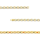 Close-up of Grandeur bracelet showing small green crystals set in polished titanium links.