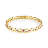 Scarlet gold-plated titanium bracelet with red crystal accents clasped front view.