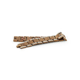 Secret Spark bracelet unclasped and folded to display interlocking copper-plated titanium links.