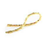 Vitalis bracelet unclasped and folded to display interlocking links and crystal accents.