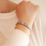 Hearts Negative Ion Bracelet – Titanium with Gold Hearts & Swarovski Crystals