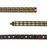 Close-up of Aegis negative ion bracelet links with black stainless steel and gold to show detail.