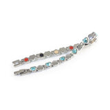 Beloved bracelet unclasped and folded to display alternating crystal and polished heart pattern.