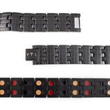 Close-up of Brilliant Black bracelet highlighting engraved checkered links and double embedded negative ion elements.