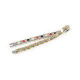 Course negative ion bracelet with stainless steel and gold, unclasped and folded for display.