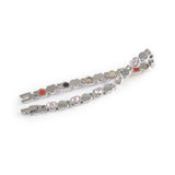 Devotion bracelet unclasped and folded to display alternating crystal and polished heart pattern.