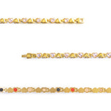 Close-up of Dream bracelet showing gold-plated settings with pink crystal heart links.
