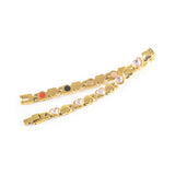 Dream bracelet unclasped and folded to display alternating crystal and polished gold heart pattern.