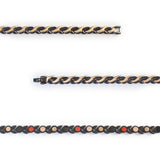 Close-up of Ethereal negative ion bracelet showing detailed black steel links with rose gold waves.