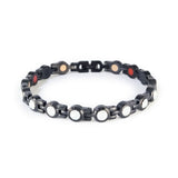 Black stainless steel bracelet with white crystal accents in clasped front display.