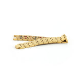 Golden Bliss polished gold stainless steel bracelet unclasped and folded to display engraved pattern and reflective finish.