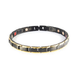 Lineage negative ion bracelet with black stainless steel and gold, front clasped view.