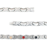 Close-up of Love bracelet showing heart and X pattern with soft matte and polished contrast and embedded negative ion elements.