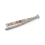 Lumina bracelet unclasped and folded to display interlocking polished links.