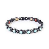 Obsidian Tide black stainless steel bracelet with matte turquoise crystals clasped front view.