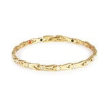 Sparkle gold titanium bracelet front view showing refined gold links and round crystal accents.