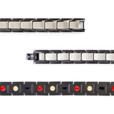 Close-up of Swell bracelet highlighting angular links, stainless steel center segments, and black borders with embedded negative ion elements.
