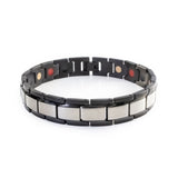Swell stainless steel bracelet front view showing silver-toned center links with polished black edges and single row of embedded elements.