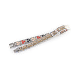 Twin Flame bracelet unclasped and folded to display link pattern and color contrast.
