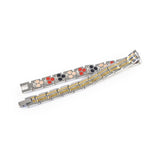 Twin Glow bracelet unclasped and folded to display striped link pattern.