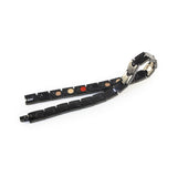 Unity negative ion bracelet with black stainless steel, unclasped and folded for display.