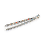Whisper bracelet unclasped and folded to display link and crystal design.